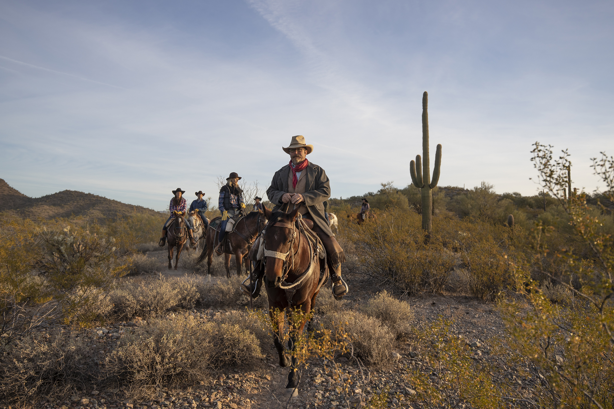 Horseback riding in the Sonoran Desert during an Arizona dude ranch vacation.